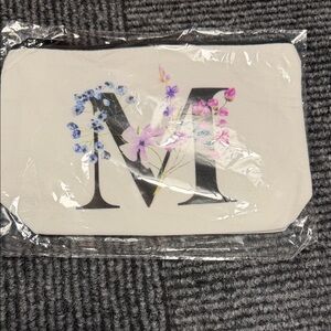 Make up bag or pencil pouch. New in bag. Monogram of “M”